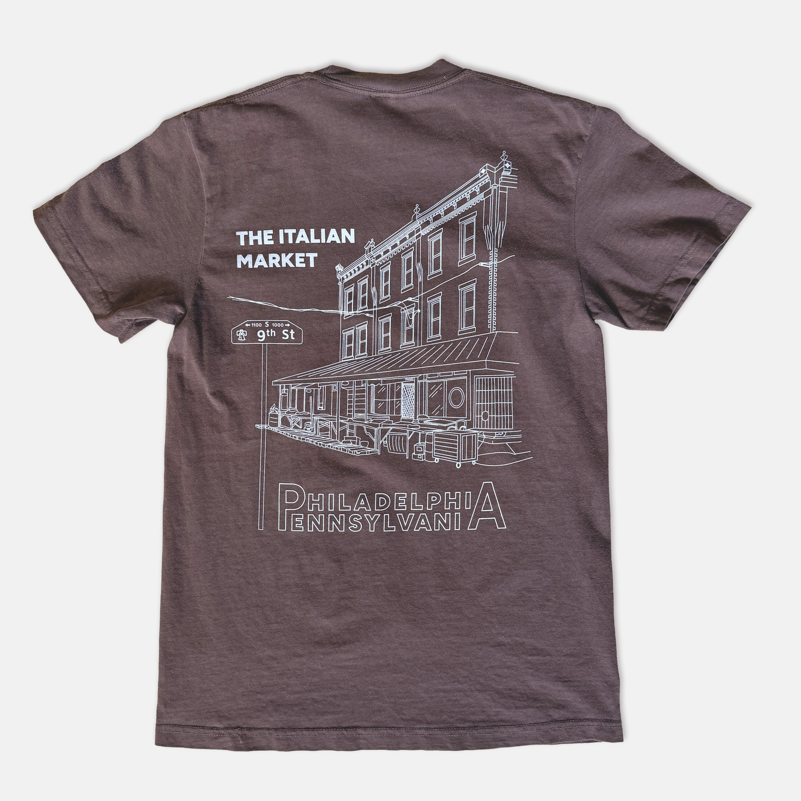 Brown t-shirt with white graphic design of The Italian Market in Philadelphia on a white background