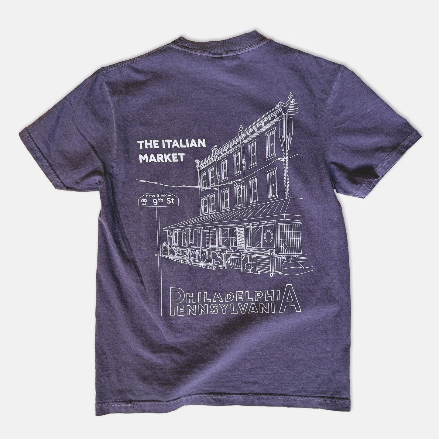 Purple t-shirt with white Italian Market graphic illustration and text